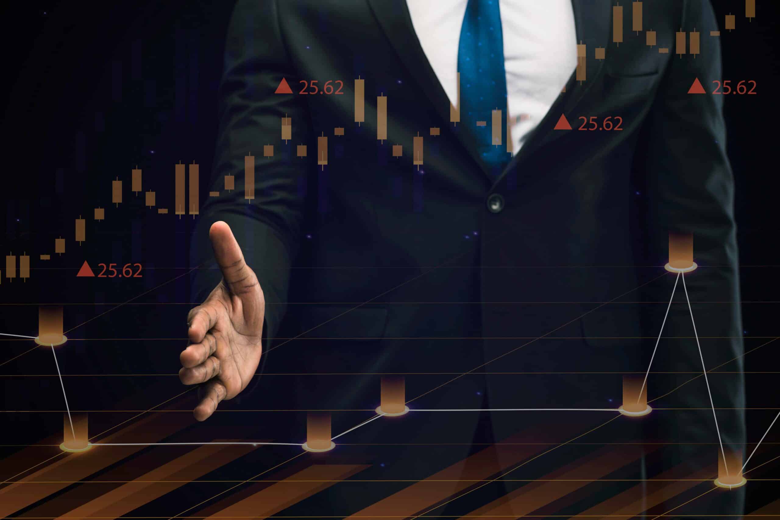 man and visual trading chart