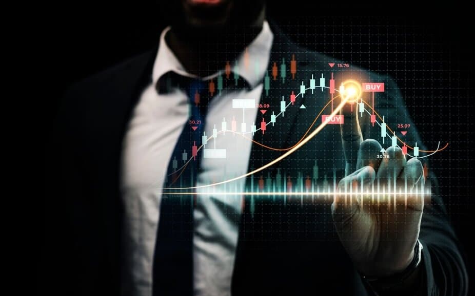 man in suit behind forex chart