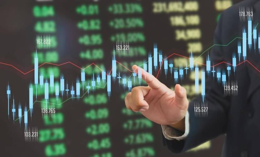 finger pointing to virtual forex chart